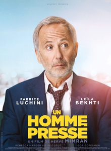 UN HOMME PRESSÉ